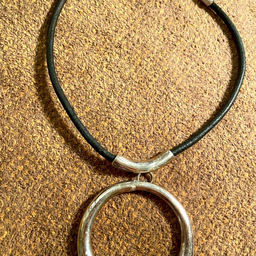 Sterling silver necklace on black leather cord